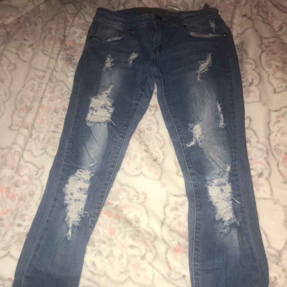 Blue distressed jeans